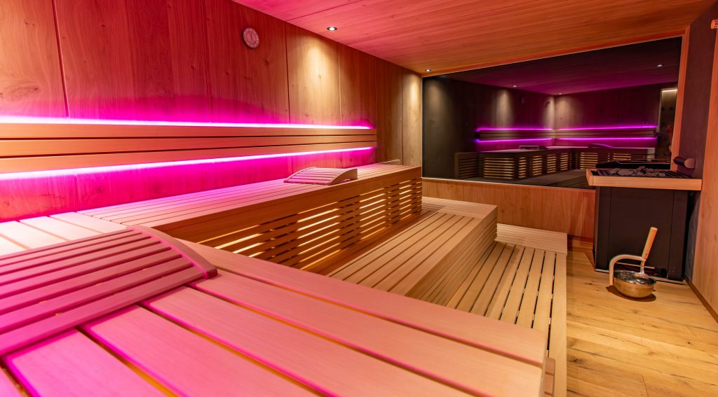Modern sauna with pink LED lighting for a special wellness experience