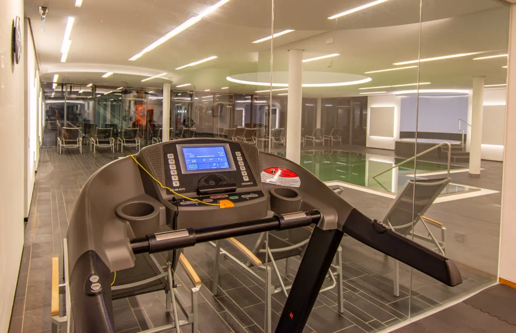 Treadmill in the Wellnesshotel Hohenrodt wellness area with modern equipment