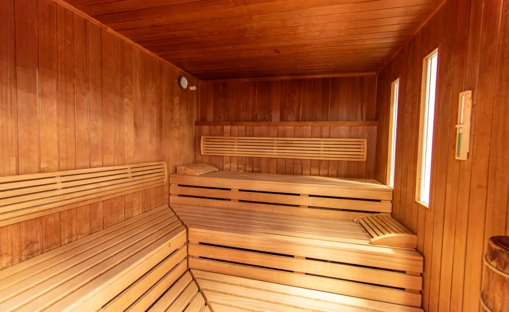 Interior view of the Finnish sauna in the Wellnesshotel Hohenrodt – high-quality sauna room with warm wooden ambience for relaxing wellness moments