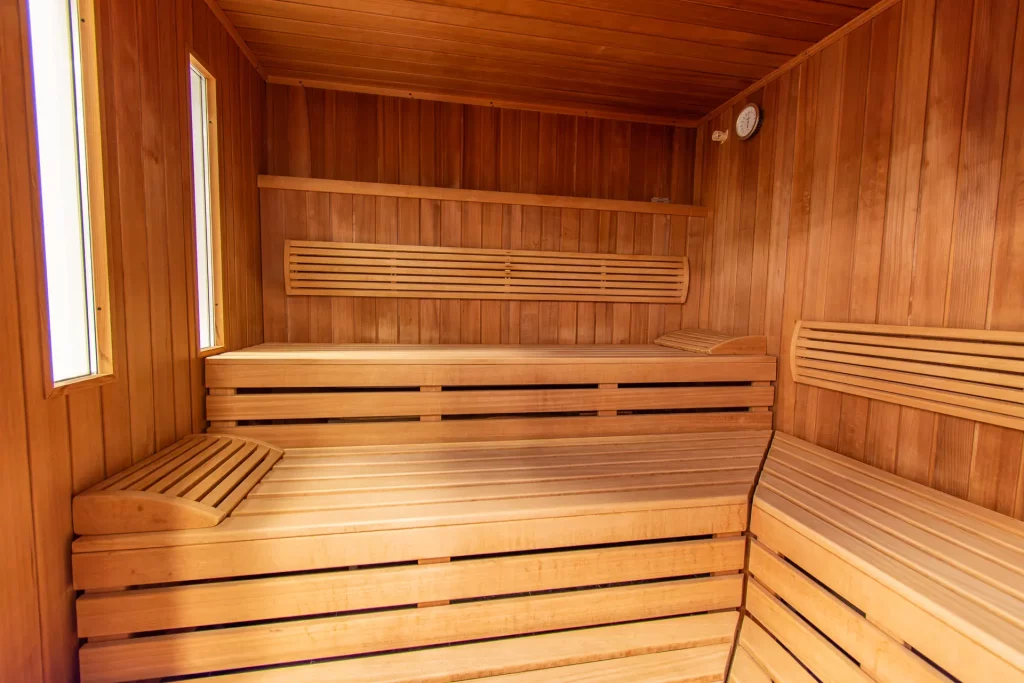 Interior view of the Finnish sauna in the Wellnesshotel Hohenrodt – high-quality sauna room with warm wooden ambience for relaxing wellness moments